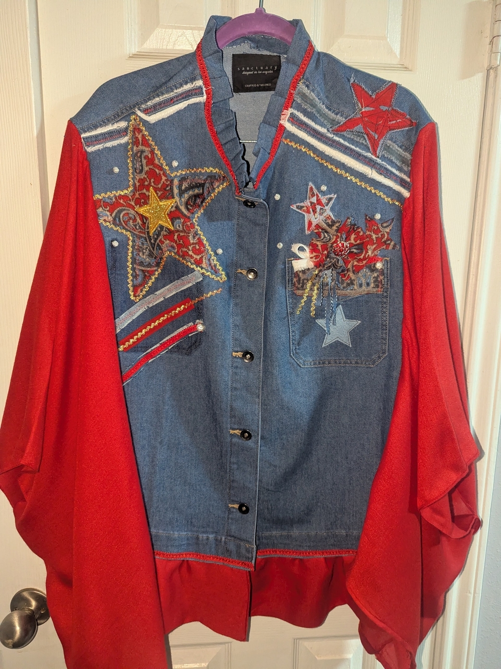 Patriotic Denim Vest with Red Sleeves and Star Embellishments